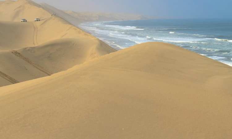 Sand Dunes of Sandwich Harbour - Namibia's Coastal Desert Landscape